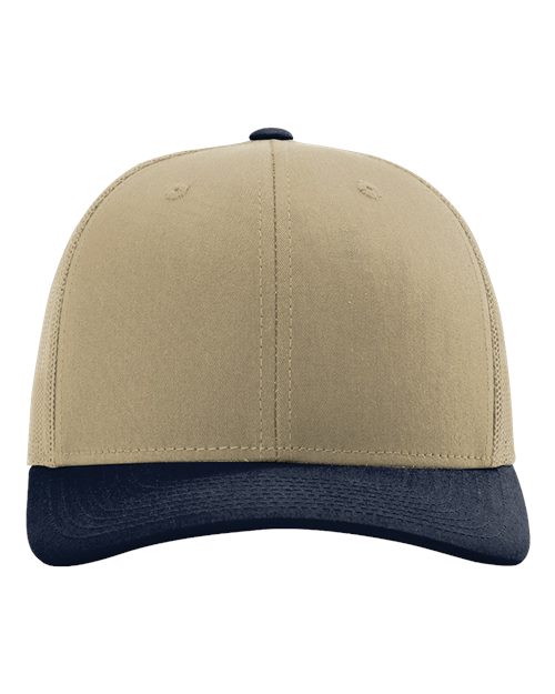 Baseball cap in tan-beige with navy brim and small ventilation eyelets
